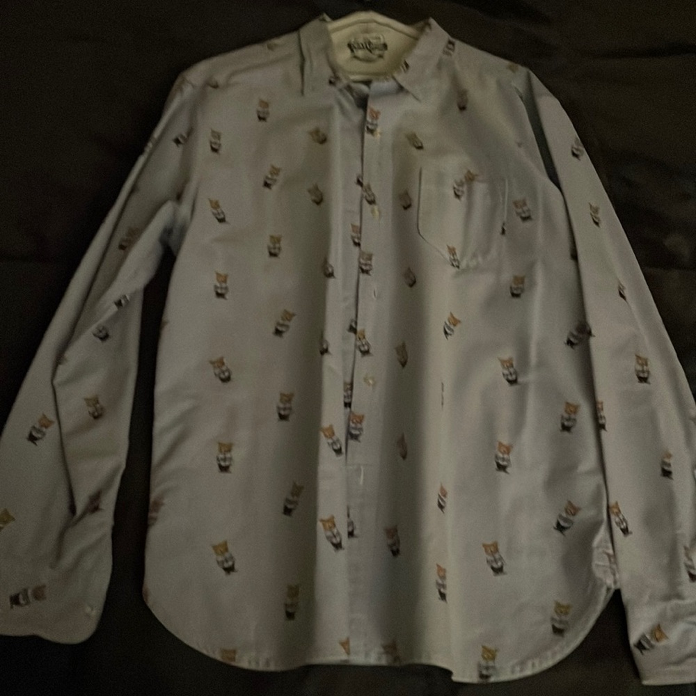 Large button up shirt from Hackings McGill with smoking fox printed on it.